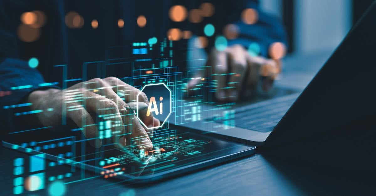 A-closeup-on-a-male-employees-hands-using-AI-in-software-development